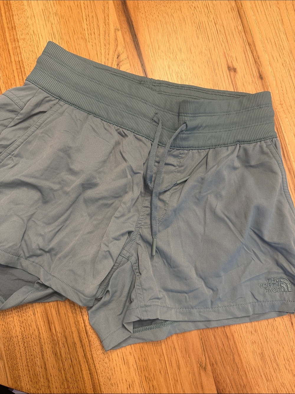 The North Face Womens Slate Blue Athletic Shorts. Color teal